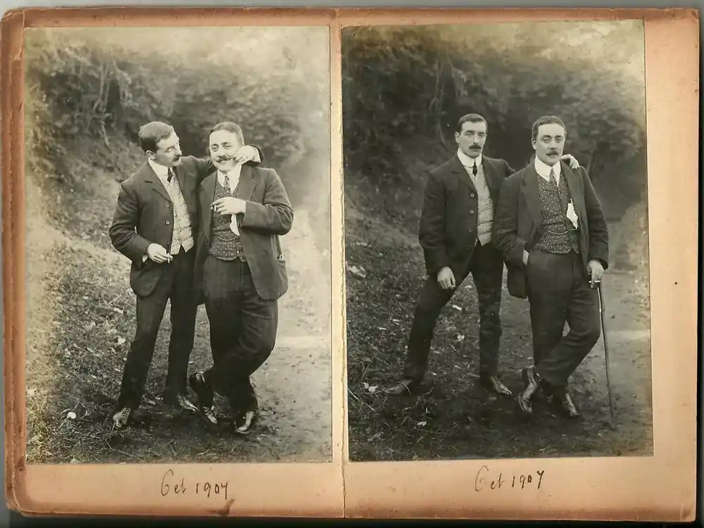 Two sepia portrait prints mounted side by side in an Edwardian album